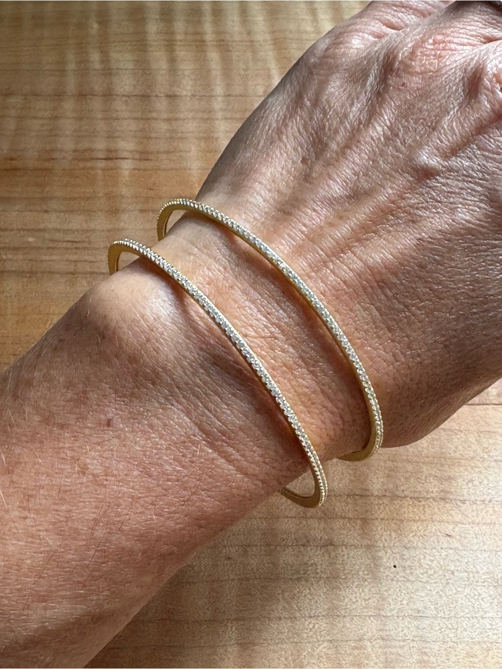 2 Freida Rothman matte gold over 925 sterling silver CZ eternity bracelets